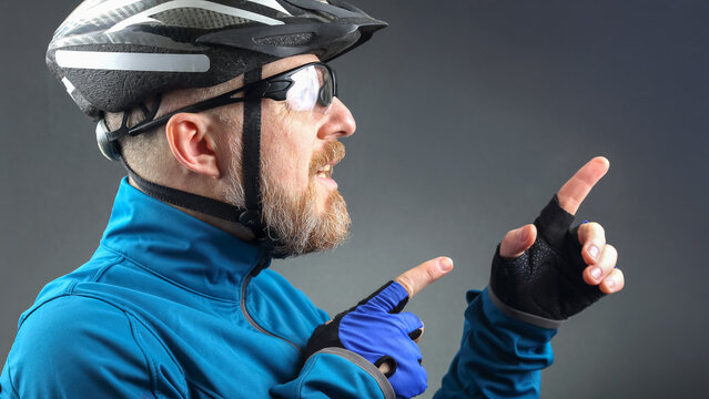 Cyclist discussing training techniques in a studio setting during evening hours