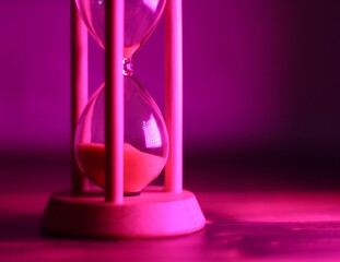 hourglass sand glass on the desk home still life photo timer as a symbol of passing time