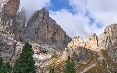 Mountain landscape in the heart of the Catinaccio group, beneath the Vajolet Towers in the Dolomites. A small Paul Preuss refuge overlooking the Vajolet Valley. Popular hiking area for a whole family.