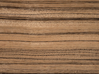 Naklejka premium Paldao veneer with pronounced stripes and rich wood texture