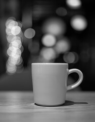 white cup on the table