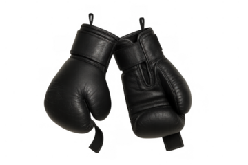 Black boxing gloves hanging for combat sport training, sparring, and fitness workout with transparent background