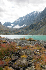 View on glacial lake Kuiguk in late august with Altai mountains in the background, Russian Federation