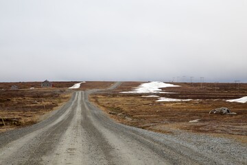 Gravel road over the mountain heath Flatruet, Harjedalen, Sweden.