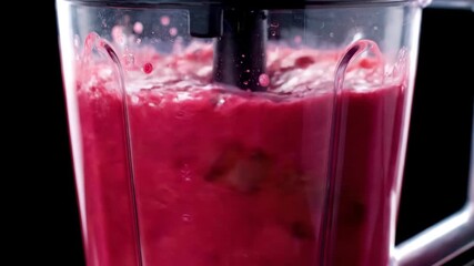 A blender mixing colorful fruit into a vibrant smoothie - Powered by Adobe