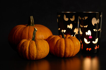 Pumpkins with spooky tea light holders. 