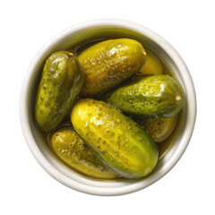 Overhead view of several small green pickles submerged in a white bowl, sitting on a black background