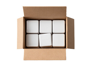 Overhead view of a cardboard box filled with six white, square-shaped objects