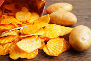 Potato chips , delicious BBQ seasoning spicy for crips, thin slice deep fried snack fast food.