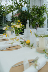 Elegant Table Setting with Floral and Lemon Decor