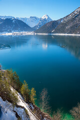 beautiful blue lake Achensee in winter. view to Pertisau and Dristenkopf mountain, austria