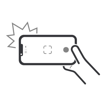 Isolated pictogram of a hand holding a smartphone taking a photo with camera flash and visible viewfinder screen interface.