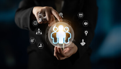 Glowing human figures surrounded by business icons representing HR data analysis, employee management, and recruitment analytics Parse