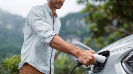 EV electronic vehicle electric hybrid car power charging station with display futuristic UI uses power supply cable charging, modern industry mode of automobile transportable eco friendly environment.