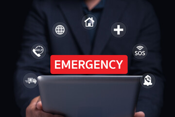A person holds a tablet displaying an "EMERGENCY" alert surrounded by icons like help, home, and SOS, symbolizing urgent communication needs.