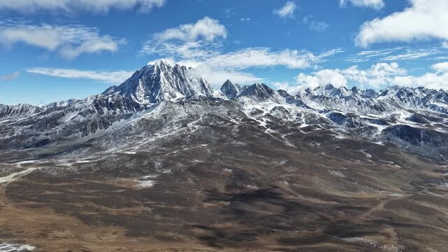 Daytime Aerial Hyperlapse of Yala Snow Mountain Sichuan, China