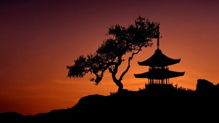 Silhouette of japanese pagoda and tree against vibrant sunset sky backdrop