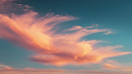 Dramatic cloud formations against a vibrant blue sky background at sunset