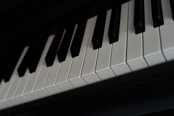 Close up of piano keyboard. Selective focus and shallow depth of field.