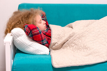  girl sleeping in bed. beautiful girl sleeps. young woman covered with a blanket lying in bed