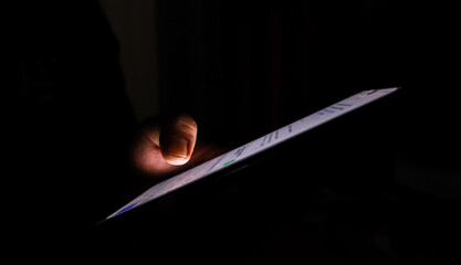 Night, cybersecurity and hands typing with phone for texting, internet troll or person cyberbullying. Dark comment, social media netizen or keyboard warrior for smartphone, online bullying or hacking