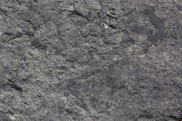 Close-up macro granite texture,Close-up of granite surface,Dark gray black slate background texture for wall covering,Close-up detailed photo of a light gray stone background.