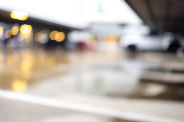 The background of the outdoor parking lot is blurred in focus,Parking lot background blurred focus,Blur focus of Lot of car parking lot at night outdoor city park city transport.