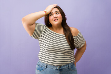 Woman feeling stressed, having headache and memory loss