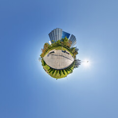 abstract swirling tiny planet spherical panorama of multi-storey buildings of skyscrapers of a...
