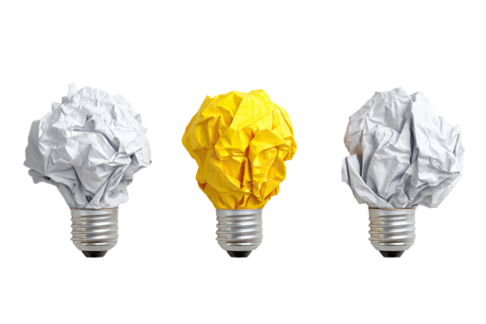 Crumpled paper lightbulbs, one yellow, two white