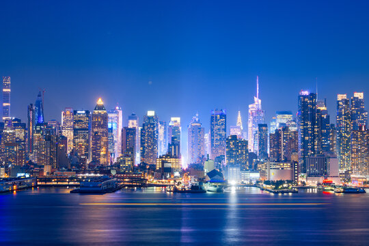 New York, New York, USA midtown skyline at dusk from the Hudson River 780