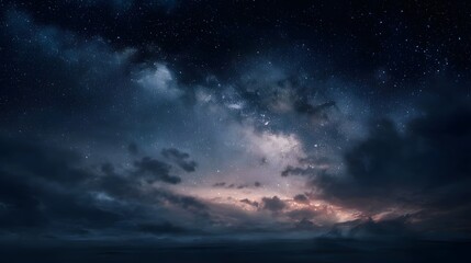 Fototapeta premium Vast night sky filled with stars and luminous cosmic clouds illuminated by twilight hues