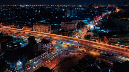 Beautiful top view of car traffic at roundabout lane and buildings. 4K drone, Urban cityscape...