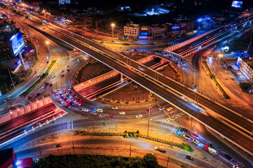 xpressway, Self-driving autonomous electric cars of the future with elements move along a busy traffic intersection. Artificial Intelligence, Car Scan, GPS Tracking, Smart Roads, IoT, highway