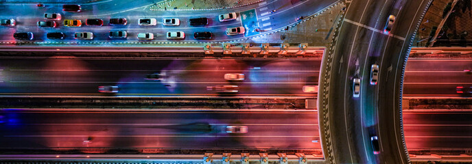 Expressway, Self-driving autonomous electric cars of the future with elements move along a busy traffic intersection. Artificial Intelligence, Car Scan, GPS Tracking, Smart Roads, IoT, highway