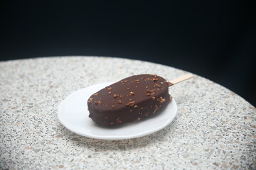 chocolate ice-cream on a white plate