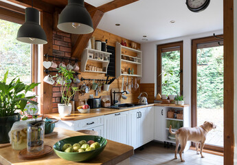 interior of modern kitchen in vintage style with white wooden furniture and rustic detail. Bright...