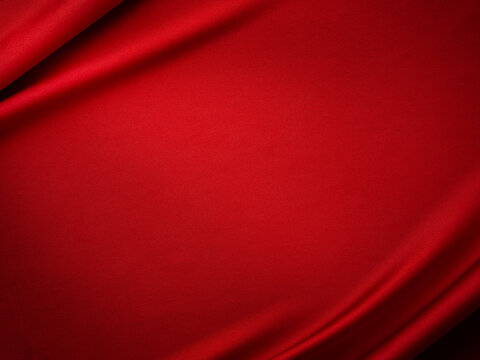 Beautiful red silk satin background. Luxury background with copy space for text, design. Flat lay, top view. Birthday, Christmas, Valentine design element.