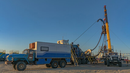 The Northern gas field. Summer. Installation for lowering a flexible pipe into a well. Equipment for testing and development of a gas well
