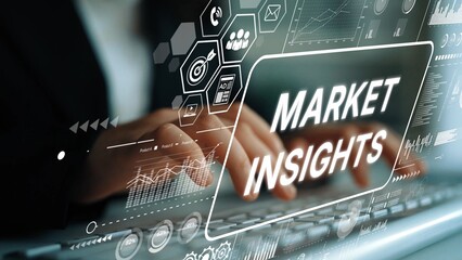 Hands typing on keyboard with digital interface showing market insights and analytical data trends...