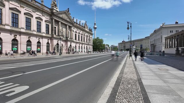 German Historical Museum on the left side &ndash; oldest building of the street &bdquo;Unter den Linden&ldquo; in Berlin, Germany, time lapse with motion blur in summertime 2024