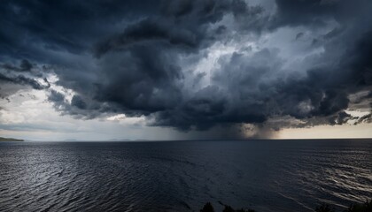 a dramatic brooding sky filled with heavy dark clouds ominous and foreboding perfect for illustrating themes of mystery suspense or impending storms powerful atmospheric nature
