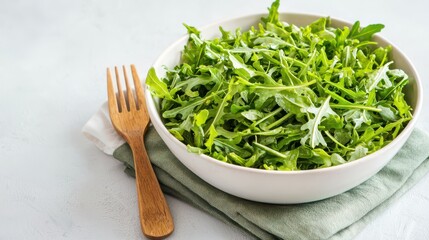 Neatly Folded Baby Onesie on Wooden Table Mat for Nursery Check
