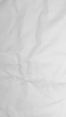 pleated white cotton material. texture or background