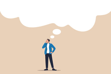 Thoughtful man standing in an empty space with a large blank thought bubble above his head representing ideas and contemplation