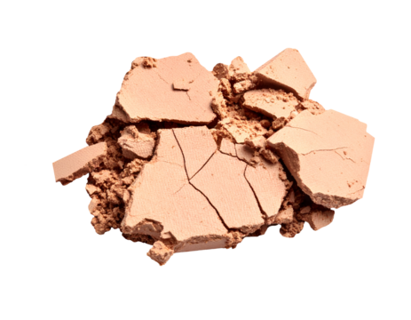 Crushed face powder cosmetic, broken compact with beige fragments and dusty crumbs, beauty product accident on isolated background