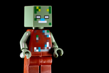 Obraz premium LEGO Minecraft Drowned standing sideways on a black background