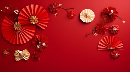 Festive red background with traditional chinese new year decorations including paper fans ornaments and bows