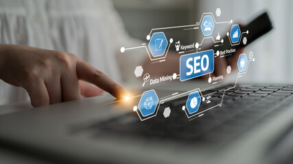 A business professional engages with digital tools for search engine optimization, showcasing the importance of data mining and strategic planning in digital marketing. Tessel