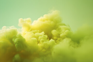 Soft chartreuse colored clouds against a pastel green backdrop  